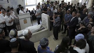 Похороны убитого террористами охранника еврейского поселения