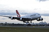 A Qantas plane landing.