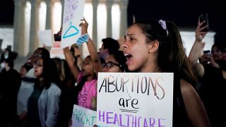 Protesters gathered outside the Supreme Court in Washington DC after news the court could back overturning abortion legislation broke