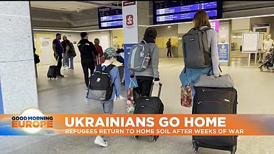 A family returning home to Ukraine to reunite with their loved ones.
