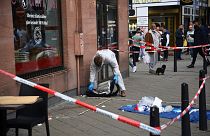 FILE --Forensics work at the scene where a man died after being stopped by police in Mannheim, Germany, Monday, May 2, 2022.