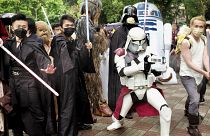 Star Wars fans appear in costumes at a local park to mark a “May the 4th be with you“ event in Taipei on May 4, 2022.