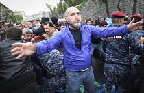 Police clash with demonstrators during a protest rally, in Yerevan, Armenia, Monday, May 2, 2022.