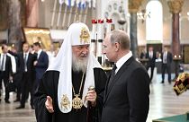 Russian President Vladimir Putin (R) and Russian Orthodox Patriarch Kirill in the Naval Cathedral in Kronshtadt, July 30, 2017.