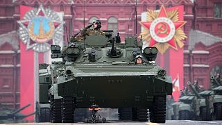 Russian military vehicles roll during the Victory Day military parade in Moscow, Russia, Monday, May 9, 2022, marking the 77th anniversary of the end of World War II