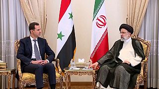 El presidente de Siria, Bashar Al Asad y el líder supremo de Irán, Ali Jameneí.