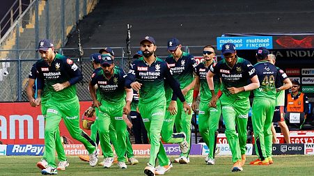 RCB, led by captain Faf du Plessis (far left), sported green jerseys in a call for greater climate action.