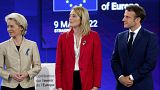 President of the European Commission, Ursula Von der Leyen, left, French president Emmanuel Macron, right, and European Parliament President Roberta Metsola, May 9, 2022.