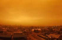 Smoke from forest fires is see over small town of Kysyl-Syr, Vilyuysky District, Sakha Republic also known as Yakutia, Russia Far East, 2021.
