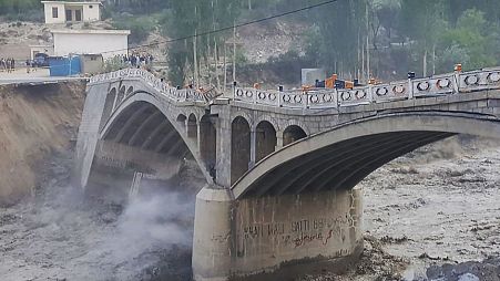 The bridge in Pakistan collapsed due to flooding.