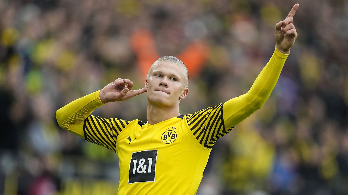 Dortmund's Erling Haaland celebrates after scoring a penalty during the German Bundesliga soccer match between Borussia Dortmund and FSV Mainz 05 in Dortmund