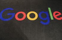 Google's logo on a carpet at the entrance hall of Google France in Paris