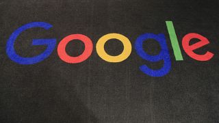 Google's logo on a carpet at the entrance hall of Google France in Paris