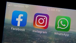 Mobile phone app logos for, from left, Facebook, Instagram and WhatsApp.