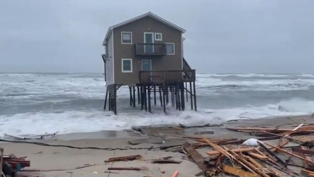 North carolina beach house collapses into the ocean during severe coastal flooding | euronews