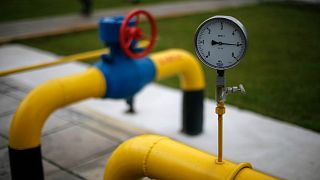Pressure gauge, pipes and valves at a gas station in the Ukrainian region of Poltava
