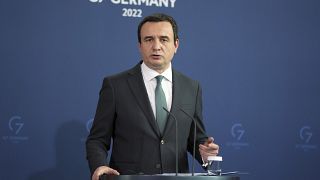 Kosovo's Prime Minister Albin Kurti addresses the media during a press conference in Germany.