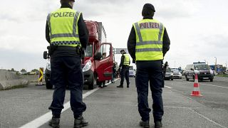 Austrian policemen check vehicles at the Hungarian border near Nickelsdorf.