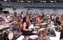 Amateur drummers rehearsing for the Rockin'1000 concert at the Stade de France.