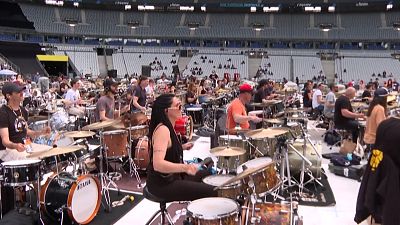 Amateur drummers rehearsing for the Rockin'1000 concert at the Stade de France.