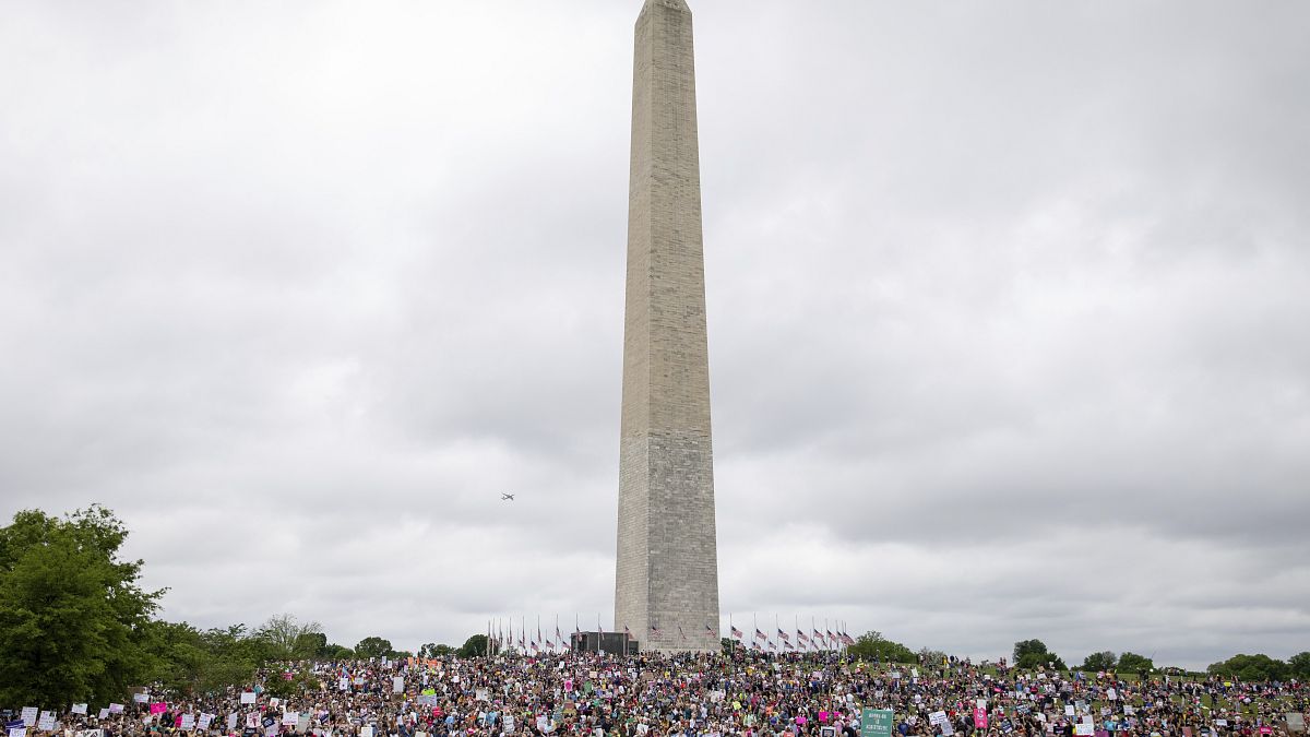 Abortion rights demonstrators rally, Saturday, May 14, 2022, on the National Mall in Washington.