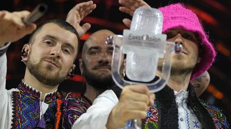 Members of the Kalush Orchestra from Ukraine celebrate after winning the Grand Final of the Eurovision Song Contest at Palaolimpico arena, in Turin, Italy, Saturday, May 14