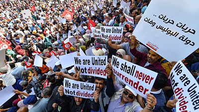 Des Tunisiens manifestent leur opposition au président Saied dans la capitale, le 15 mai 2022