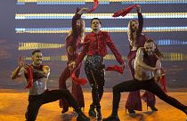 WRS from Romania singing Llamane performs during the Grand Final of the Eurovision Song Contest at Palaolimpico arena, in Turin, Italy, Saturday, May 14, 2022.