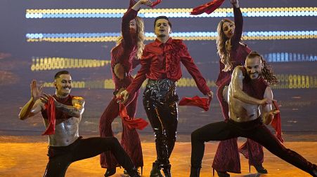 WRS from Romania singing Llamane performs during the Grand Final of the Eurovision Song Contest at Palaolimpico arena, in Turin, Italy, Saturday, May 14, 2022.