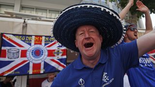Rangers supporters react in downtown Seville, Spain, Wednesday, May 18, 2022