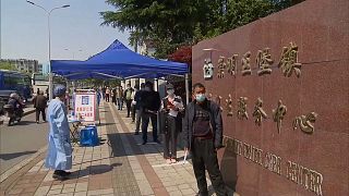 Filas para vacinação em Xangai
