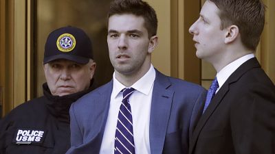 Billy McFarland, the promoter of the failed Fyre Festival in the Bahamas, leaves federal court after pleading guilty to wire fraud charges.