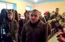 Ukrainian servicemen in a penal colony in Olyonivka, territory under the Donetsk People's Republic's control, after leaving the besieged Azovstal plant in Mariupol.