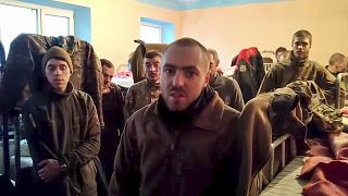 Ukrainian servicemen in a penal colony in Olyonivka, territory under the Donetsk People's Republic's control, after leaving the besieged Azovstal plant in Mariupol.