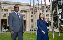 Rwandan Foreign Minister Vincent Biruta (L) and Britain's Home Secretary Priti Patel (R) at the United Nations in Geneva.