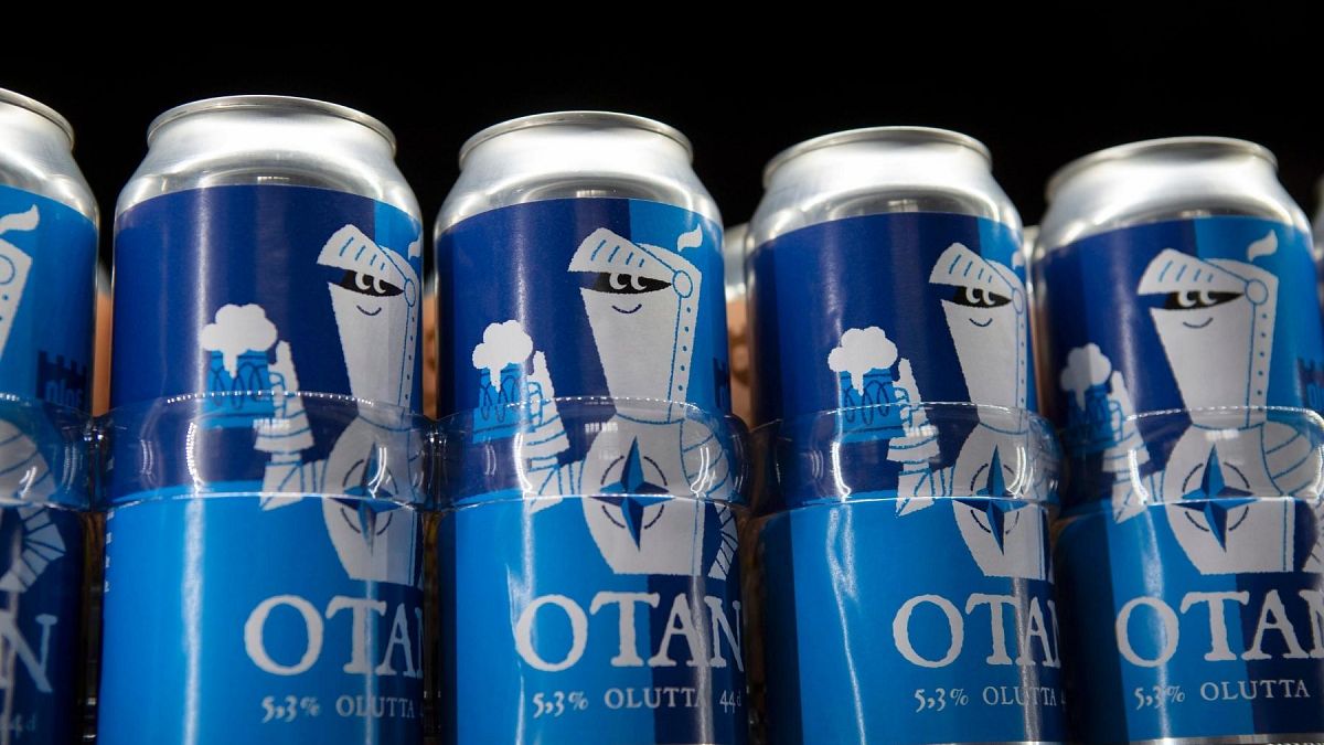Beer cans with writing OTAN inspired by the North Atlantic Treaty Organization (NATO) logo by Olaf Brewing, in Savonlinna, eastern Finland, Tuesday, May 17, 2022