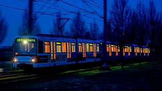 A metro train approaches a station on the outskirts of Frankfurt.