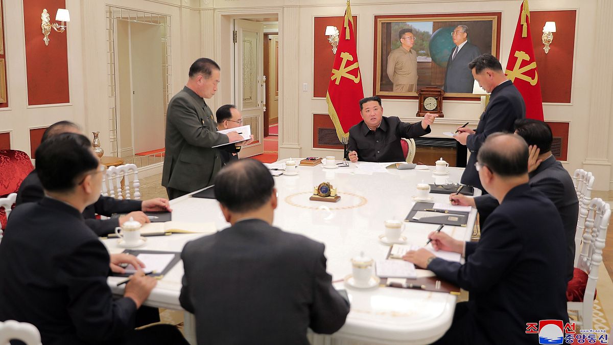 Kimg Jong UN and Ministers