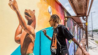 Massive Cotonou mural tells Benin's history