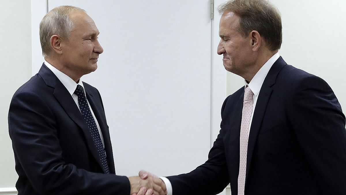 خلال لقاء بين الرئيس الروسي بوتين وميدفيتشوك في 2019