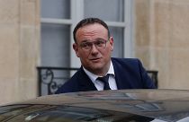 New French Minister of Solidarity Damien Abad leaves the Elysee Palace on Monday.