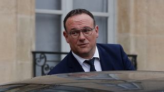 New French Minister of Solidarity Damien Abad leaves the Elysee Palace on Monday.