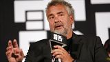Director Luc Besson speaks to the media during a press conference for his movie "Lucy"