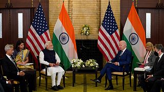U.S. President Joe Biden, right, meets with Indian Prime Minister Narendra Modi during the Quad leaders summit at Kantei Palace, Tuesday, May 24, 2022, in Tokyo.