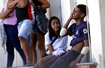 Un blessé pleure après avoir été soigné à l'hôpital Getulio Vargas, après une descente de police dans la favela de Vila Cruzeiro (Rio de Janeiro), le mardi 24 mai 2022.