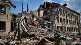 Destroyed houses are seen after Russian shelling in Soledar, Donetsk region, Ukraine, Tuesday, May 24, 2022.