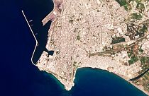 Satellite photos analyzed by AP on Wednesday showed the Russian-flagged Matros Pozynich believed to be carrying stolen Ukrainian grain inside the harbor of Latakia