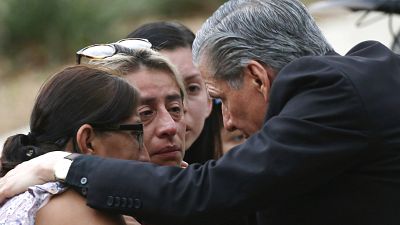  The archbishop of San Antonio comforts families following a deadly school shooting at Robb Elementary School in Uvalde.