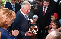 Britain's Prince Charles and Princess Margaret, the Custodian of the Romanian Crown, visit a centre for refugees fleeing the war in Ukraine, in Bucharest, Romania.
