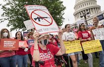 Des militants devant le Capitole à Washington pour demander un contrôle des armes à feu, jeudi 26 mai 2022.